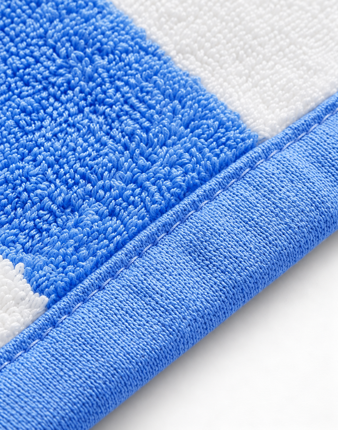 Beach towels — actual terry loops and stitched hem detail