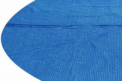 Solar pool cover — actual PE texture, seam and left-edge detail